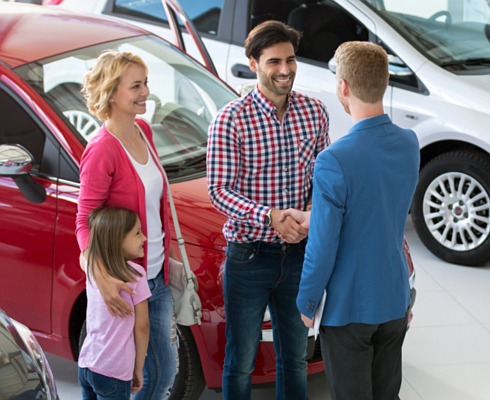 Family buying a car with finance.