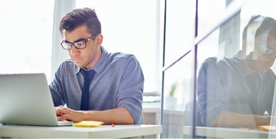 Man using a laptop.