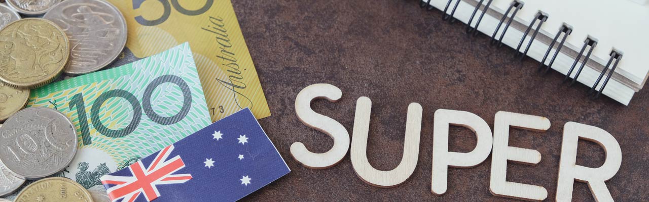 Australian flag, coins and notes with superannuation sign.