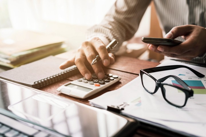 Man reviewing finances, accounts and SMSF.