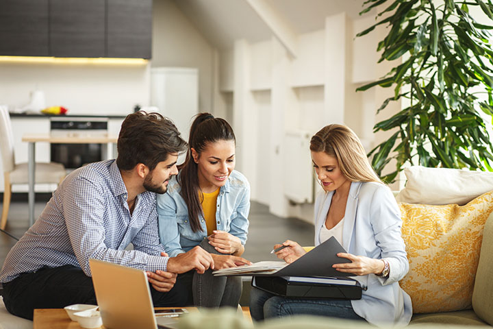 Couple meeting a financial planner.